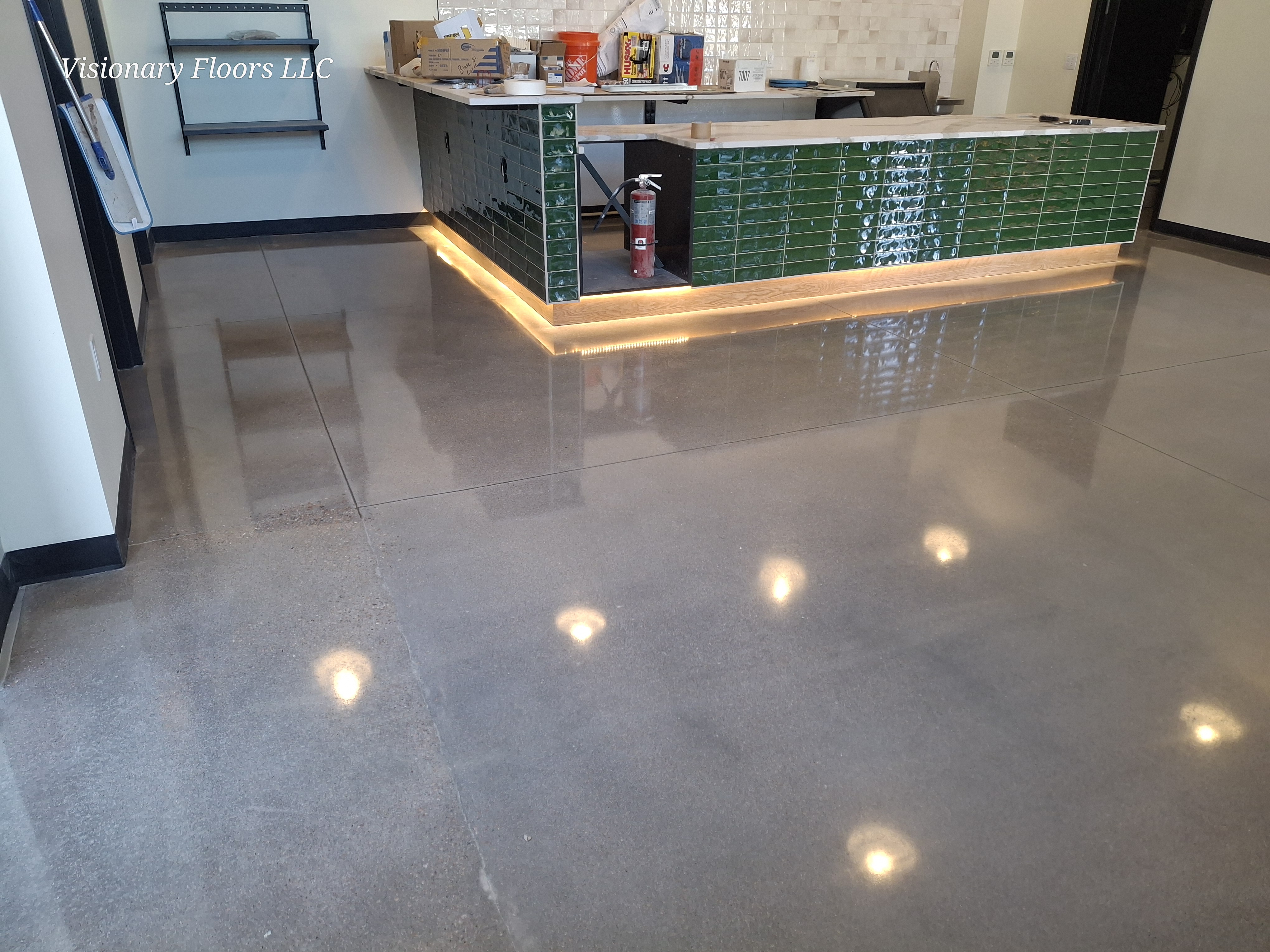 Polished concrete floor with mirror finish and light reflections — polished concrete Denver CO